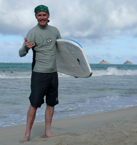 U.S. Dive Travel founder John Hessburg, after surfing Kailua Beach Park, boogie boarding at Kalama.